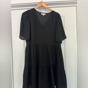 Jade knee length black dress